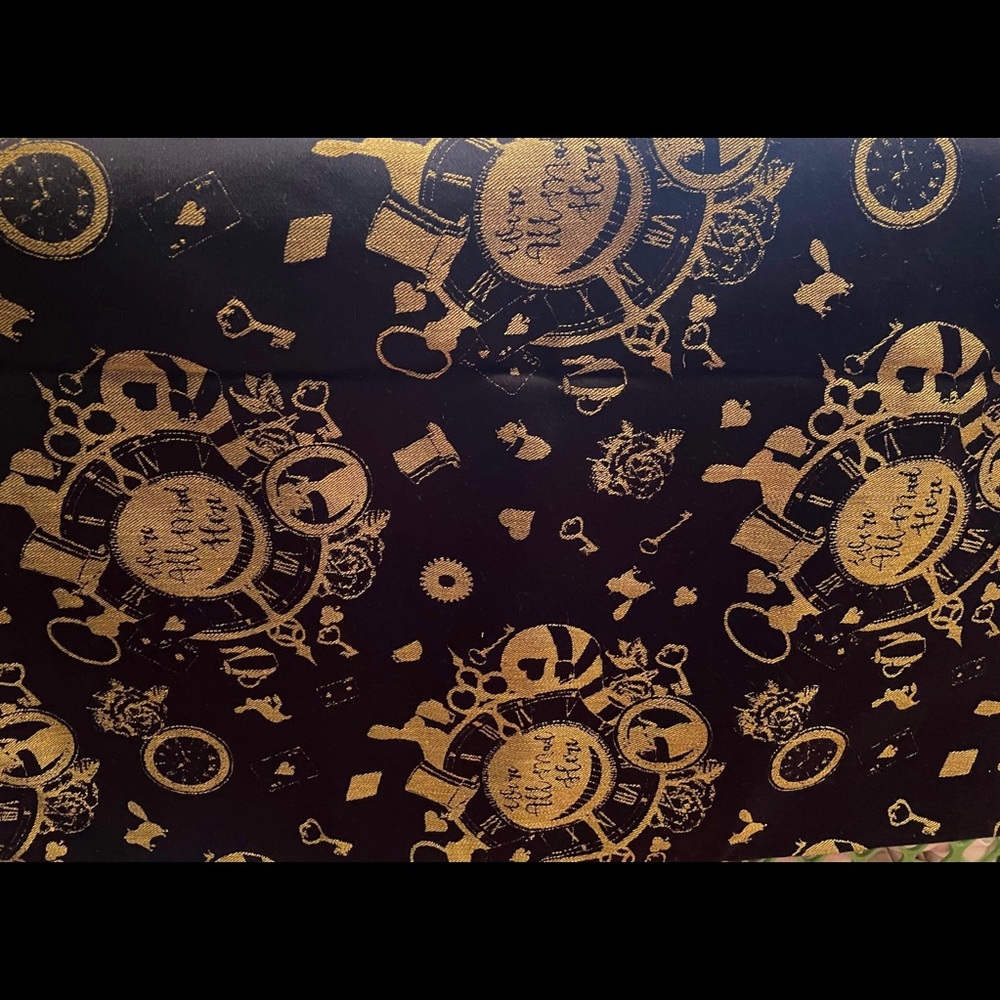 Luluna Alice in wonderland golden eclipse baby wrap
